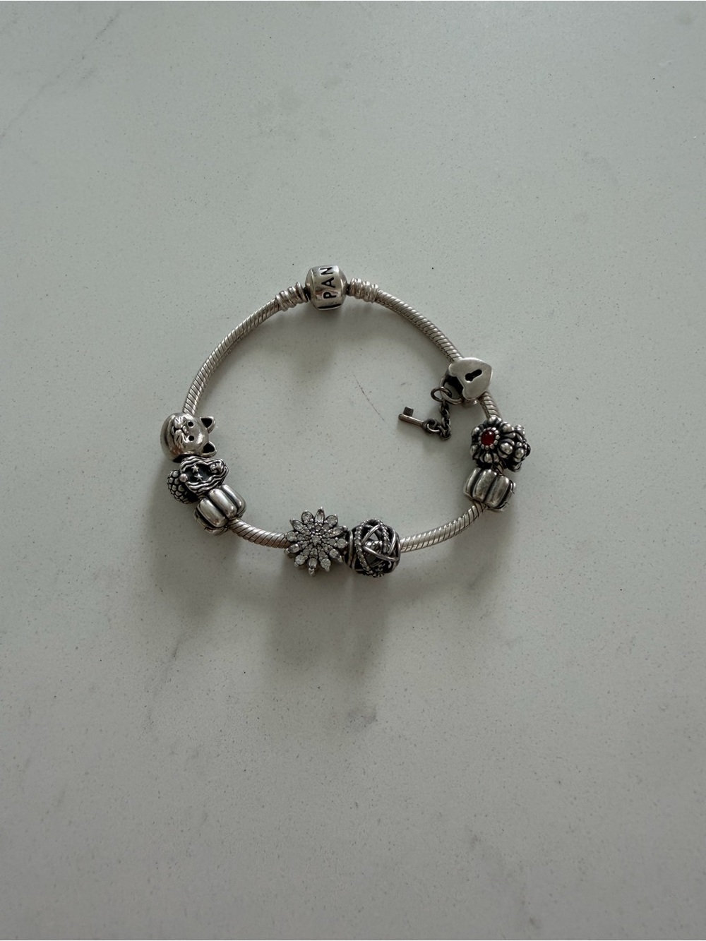 Pandora Silver Charm Bracelet with Floral and Heart Charms